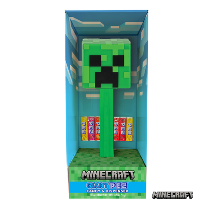 Minecraft Creeper Pez candy dispenser in its original blue window box packaging, featuring a green Creeper head dispenser and six colorful candy bars inside.