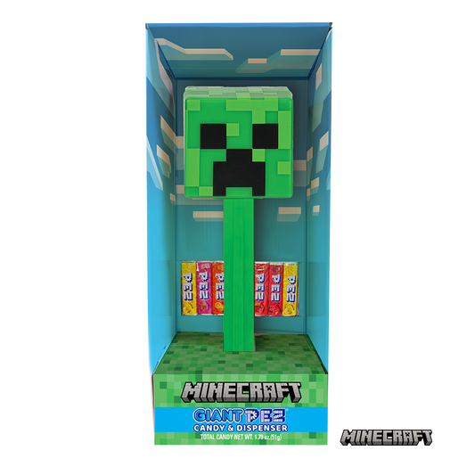 Minecraft Creeper Pez candy dispenser in its original blue window box packaging, featuring a green Creeper head dispenser and six colorful candy bars inside.